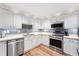 Modern kitchen with stainless steel appliances and white cabinets at 5321 Cordgrass Bend Ln, Port Orange, FL 32128