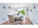 Bright dining room with table and chairs, access to backyard at 5321 Cordgrass Bend Ln, Port Orange, FL 32128