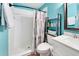 Clean bathroom with white tile shower, updated vanity, and decorative accents at 5321 Cordgrass Bend Ln, Port Orange, FL 32128