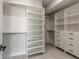 Large walk-in closet with ample shelving and hanging space at 702 Skylane Cir, Edgewater, FL 32132