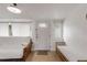 Bright entryway with whitewashed brick, comfy couch, and a welcoming door at 119 Hardin Pl, Edgewater, FL 32132