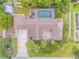 Overhead view showing home, pool, and surrounding landscape at 119 Hardin Pl, Edgewater, FL 32132