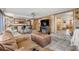 Spacious sunroom with a wet bar and comfortable seating at 327 Due East St, New Smyrna Beach, FL 32169