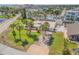 Aerial view of single-Gathering home with large yard, driveway, and ocean views at 327 Due East St, New Smyrna Beach, FL 32169