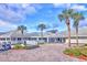Spruce Creek Country Club entrance with golf carts at 2051 Cornell Pl, Port Orange, FL 32128