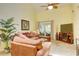 Relaxing living room with leather couches and a fireplace at 2051 Cornell Pl, Port Orange, FL 32128