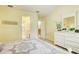 Main bedroom with en-suite bathroom and ample closet space at 2051 Cornell Pl, Port Orange, FL 32128