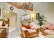 Open living room with high ceilings and view of kitchen at 2051 Cornell Pl, Port Orange, FL 32128