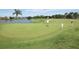 Gathering enjoying a round of golf on a beautiful course at 2051 Cornell Pl, Port Orange, FL 32128