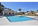 Relaxing community pool with a shaded seating area at 2051 Cornell Pl, Port Orange, FL 32128