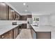 Modern kitchen with stainless steel appliances and white quartz countertops at 15190 Cr-565A, Clermont, FL 34711