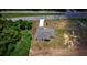 Aerial view of house with paved driveway at 15190 Cr-565A, Clermont, FL 34711