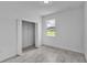Bright bedroom with large window,tile flooring and spacious closet at 15190 Cr-565A, Clermont, FL 34711