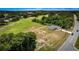 Aerial view of a house on a golf course, highlighting its desirable location at 15190 Cr-565A, Clermont, FL 34711