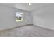 Bright bedroom with large window,tile flooring and closet at 15190 Cr-565A, Clermont, FL 34711