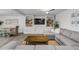 Open concept living area with a large sectional sofa and built-in entertainment center at 40 Oak Tree Dr, New Smyrna Beach, FL 32169