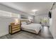 Main bedroom with king-size bed and access to private deck at 40 Oak Tree Dr, New Smyrna Beach, FL 32169