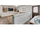 Open living room with built-in shelving and a comfortable sectional sofa at 40 Oak Tree Dr, New Smyrna Beach, FL 32169