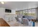 Sunroom with seating area, wet bar, and views of the backyard at 40 Oak Tree Dr, New Smyrna Beach, FL 32169