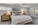 Main bedroom with king-size bed and access to a patio at 40 Oak Tree Dr, New Smyrna Beach, FL 32169