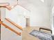 Wooden staircase leading to the upper level at 624 Volco Rd, Edgewater, FL 32141