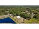 Dome house nestled in wooded area near water at 624 Volco Rd, Edgewater, FL 32141