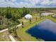 Aerial view of dome house and surrounding landscape at 624 Volco Rd, Edgewater, FL 32141