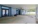 Screened porch with dual French doors and ceiling fan at 1319 Orange Tree Dr, Edgewater, FL 32132