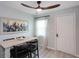 Bright dining area with table, chairs, and large artwork at 3750 S Atlantic Ave # 180, Daytona Beach Shores, FL 32118