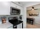 Updated kitchen with stainless steel appliances and marble countertops at 3750 S Atlantic Ave # 180, Daytona Beach Shores, FL 32118