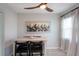 Bright dining area with table, chairs, and large artwork at 3750 S Atlantic Ave # 180, Daytona Beach Shores, FL 32118