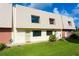 Exterior view of building, showing multiple units and lawn at 3750 S Atlantic Ave # 180, Daytona Beach Shores, FL 32118