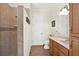 Bathroom with walk-in shower and built-in shelves at 3650 Pepper Ln, New Smyrna Beach, FL 32168