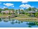 Picturesque property with a pond, gazebo, and a charming house in the background at 3650 Pepper Ln, New Smyrna Beach, FL 32168