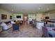 Open concept living room and kitchen with tile floors at 1726 Red Rock Rd, New Smyrna Beach, FL 32168