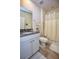 Bathroom with shower, toilet, and vanity at 1726 Red Rock Rd, New Smyrna Beach, FL 32168