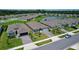 Community view with houses and a pond at 1726 Red Rock Rd, New Smyrna Beach, FL 32168