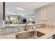 Modern kitchen with a stylish sink and granite countertop at 4650 Links Village Dr # D-501, Ponce Inlet, FL 32127