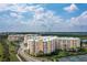 Luxury condo building with tennis courts and ocean views at 4650 Links Village Dr # D-501, Ponce Inlet, FL 32127