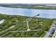 Elevated boardwalk winds through mangrove wetlands at 4650 Links Village Dr # D-501, Ponce Inlet, FL 32127