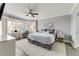 Comfortable bedroom with a king-size bed and sitting area at 4650 Links Village Dr # D-501, Ponce Inlet, FL 32127