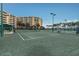 Well-maintained tennis courts for residents' use at 4650 Links Village Dr # D-501, Ponce Inlet, FL 32127