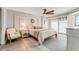 Spacious bedroom with a king-size bed and access to balcony at 4650 Links Village Dr # D-501, Ponce Inlet, FL 32127