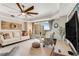 Relaxing living room with comfortable seating and large TV at 4650 Links Village Dr # D-501, Ponce Inlet, FL 32127
