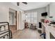 Small kitchen with white cabinets, granite countertops, and stainless steel appliances at 4650 Links Village Dr # D-501, Ponce Inlet, FL 32127