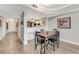 Charming dining room with wood table and chairs at 4650 Links Village Dr # D-501, Ponce Inlet, FL 32127