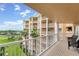 Private balcony offering scenic views of the resort at 4650 Links Village Dr # D-501, Ponce Inlet, FL 32127