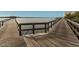 Community boardwalk with peaceful water views at 4650 Links Village Dr # D-501, Ponce Inlet, FL 32127