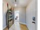 Bright entryway with tile flooring and built-in shelving unit at 406 Bouchelle Dr # 206, New Smyrna Beach, FL 32169
