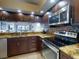 Modern kitchen with stainless steel appliances and granite countertops at 406 Bouchelle Dr # 206, New Smyrna Beach, FL 32169